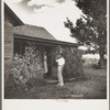 Doctor Tugwell visiting rehabilitation client's home. South Dakota