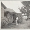 Doctor Tugwell visiting rehabilitation client's home. South Dakota