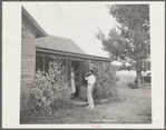 Doctor Tugwell visiting rehabilitation client's home. South Dakota