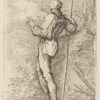 Soldier, Standing, Holding a Long Cane before a Rocky Wall