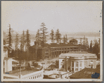 Looking down on the Forestry Building, the Washington State Building in the foreground. Alaska Yukon Pacific Exposition