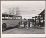 Migrant high school students arriving home from school. Tulare migrant camp. Visalia, California