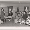 Presidents of ladies club addressing members. Tulare migrant camp. Visalia, California