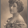 Portrait of a woman wearing diamonds and floral embellishments  