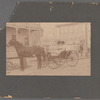 Portrait of two women in horse-drawn carriage