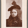 Portrait of a woman with feathered hat 