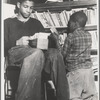 Two young boys with books 