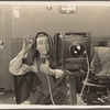 Edward Everett Horton behind the camera in the motion picture No Publicity