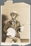 Eddie Cantor in blackface with banjo in the stage production Ziegfeld Follies of 1923