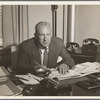 George Abbott at his desk