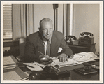 George Abbott at his desk