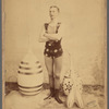 Publicity photograph of juggler Gus Hill with Indian clubs