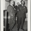 Reverend John H. Johnson (left) and New York Police Department Captain Arthur Hill attending an unidentified police gathering