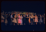 Judy Holliday, Sydney Chaplin [center] and unidentified others in the stage production Bells Are Ringing