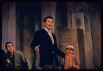 Sydney Chaplin [center] and unidentified others in the stage production Bells Are Ringing