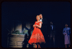 Judy Holliday, Sydney Chaplin [center] and unidentified others in the stage production Bells Are Ringing