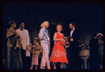 Judy Holliday, Sydney Chaplin [center] and unidentified others in the stage production Bells Are Ringing
