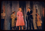 Judy Holliday, Sydney Chaplin [center] and unidentified others in the stage production Bells Are Ringing