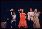 George S. Irving, Sydney Chaplin, Judy Holliday [center] and unidentified others in the stage production Bells Are Ringing