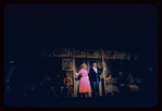 Judy Holliday, Sydney Chaplin [center] and unidentified others in the stage production Bells Are Ringing