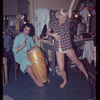 Carmen Alvarez [left] and unidentified other backstage during the stage production Lil' Abner