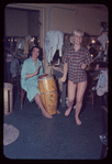 Carmen Alvarez [left] and unidentified other backstage during the stage production Lil' Abner