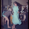 Carmen Alvarez [right] and unidentified other backstage during the stage production Lil' Abner