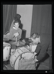 Rich seated at drums with unidentified man