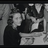 Wright signing autographs
