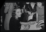 Wright signing autographs