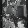 Wright seated with ensemble