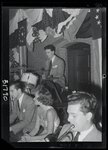 Wright seated with ensemble