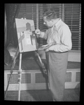 Wettling painting at easel