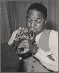 Page playing trumpet