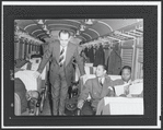 Tizol with band members on train
