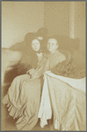 Loie Fuller and mother sitting on sofa