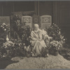 Loie Fuller at funeral surrounded by flowers