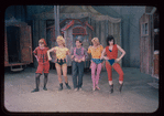 Pierre Olaf [center] and unidentified others in the stage production Carnival