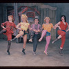 Pierre Olaf [center] and unidentified others in the stage production Carnival