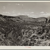 The Deschutes River Canyon covered with sparse grass, stunted cedars and rimrock. Central Oregon grazing project