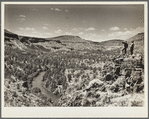 The Deschutes River Canyon covered with sparse grass, stunted cedars and rimrock. Central Oregon grazing project