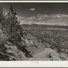 A stock trail built by the Resettlement Administration leading to the Deschutes River. Peaks of the Cascades in the distance. Oregon