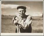 A one-armed sheep herder. Central Oregon grazing project