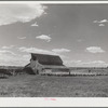 Herders in transit putting their sheep up for the night at a ranch on the Resettlement Administration grazing project in central Oregon