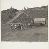 Resettlement Administration workers coming back to Rimrock Camp after work. Madras, Oregon