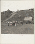 Resettlement Administration workers coming back to Rimrock Camp after work. Madras, Oregon
