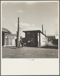 Hooverville shack with outdoor store. This man obtains seasonal employment in the Yakima and Willamette fruit orchards. [Portland,] Oregon