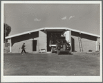 Truck loading potatoes at storage cellar. Monte Vista, Colorado