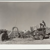 Filling a trench silo. Montrose County, Colorado