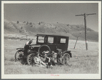 Vernon Evans and family of Lemmon, South Dakota, near Missoula, Montana, Highway 10. Leaving the grasshopper-ridden and drought-stricken area for a new start in Oregon and Washington